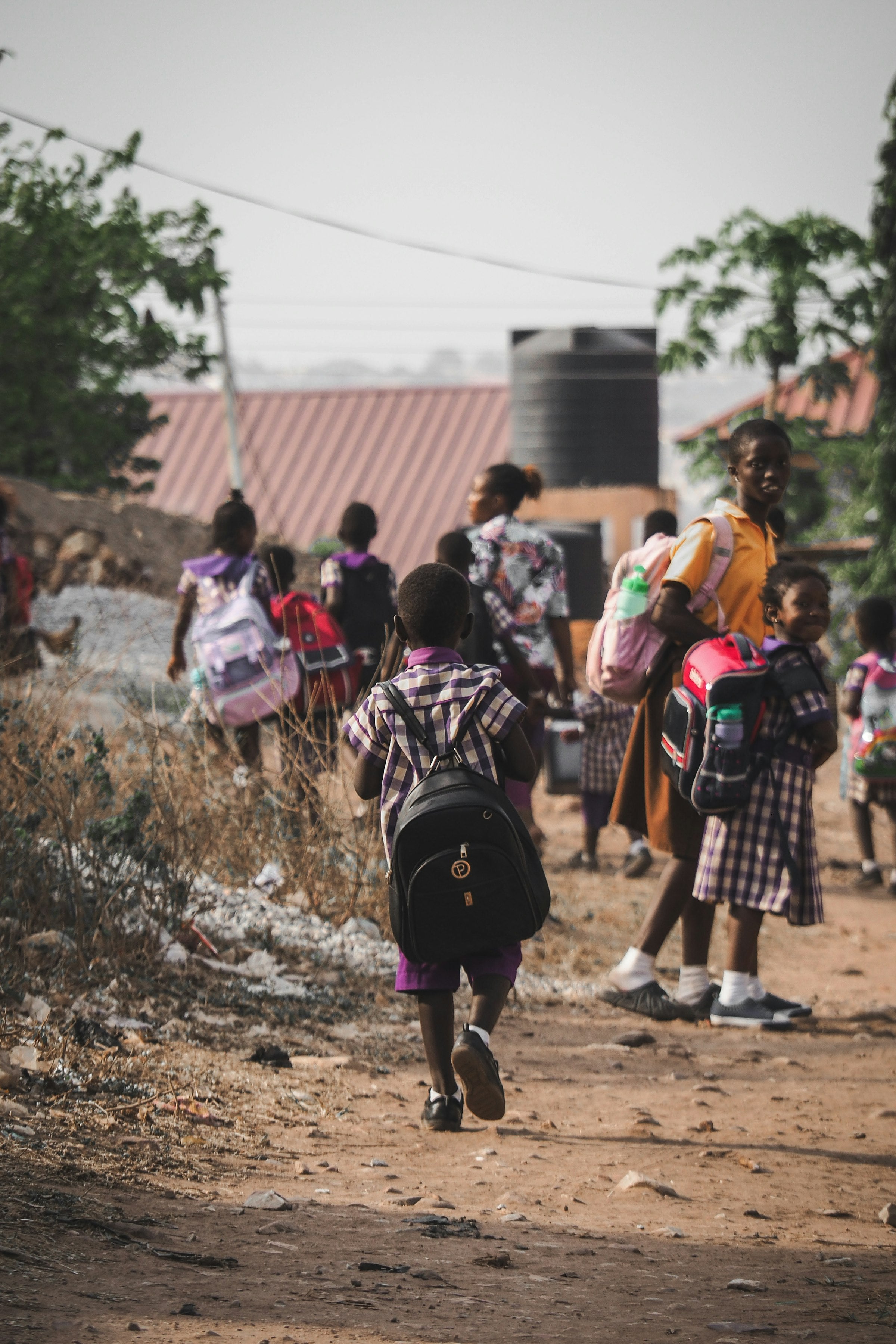 Kids walking to school with backpacks